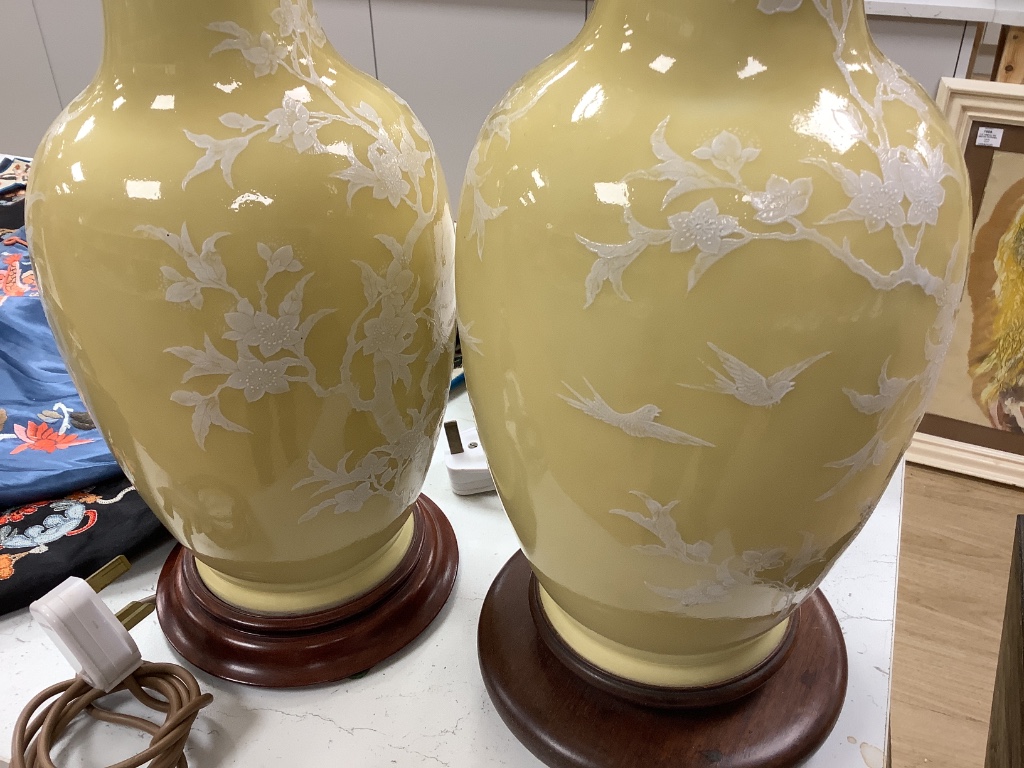 A pair of Chinese yellow ground table lamps, height 38cm not including electric fitting